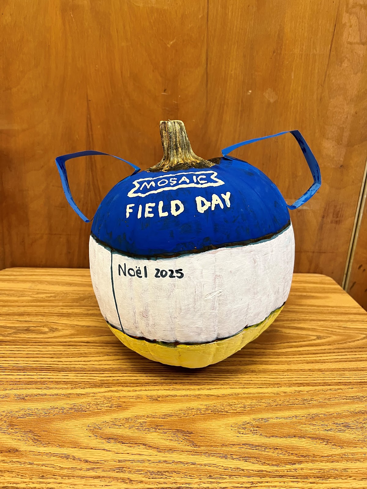 pumpkin decorated like field day jug